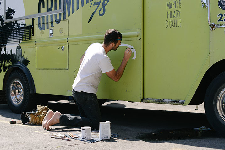 Mr Sign working on a food truck